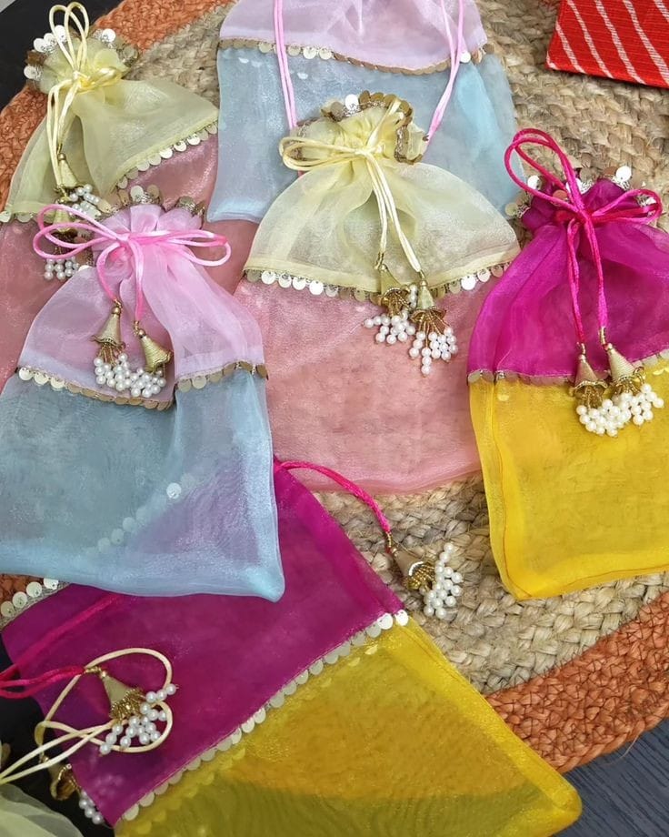 LAMANSH 7*9 inch multicolor Organza plain Potli bags for Giveaways 🎁  Favours Shagun Pouch Return Gifts for Haldi mehendi roka wedding