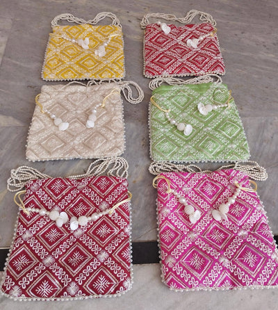 100 Rs each on buying 🏷50+ qty | Call 📞 at 8619550223 Women's Potli Bag Designer Embroidered potli bags for wedding favours 🎁 and giveaways to bridesmaids in haldi Mehendi ceremony