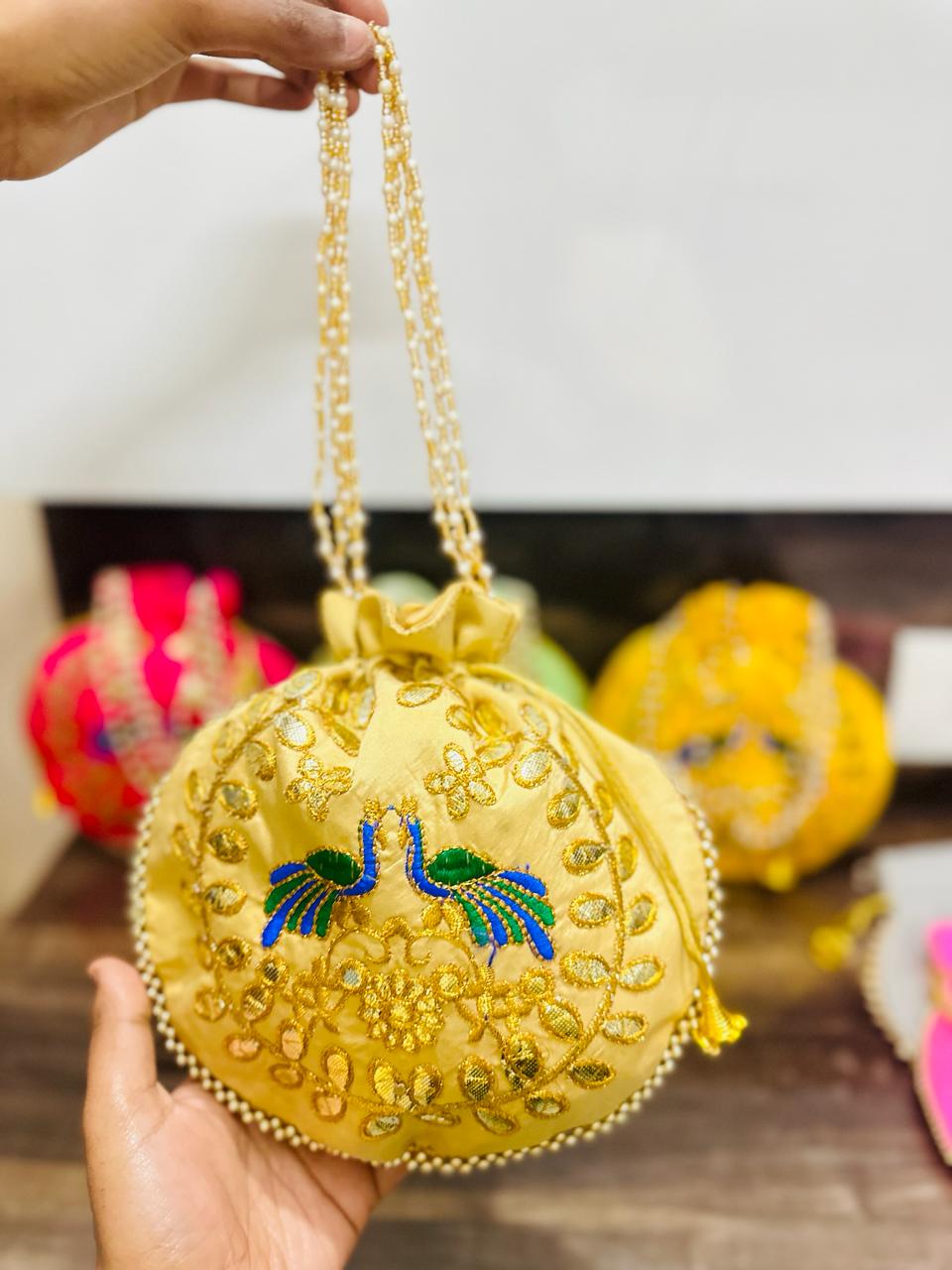 100 Rs each on buying in bulk 50+qty / Whatsapp at 8619550223 to order Women's Potli Bag Pack of 1 LAMANSH (9*9 inch) Peacock Embroidered potli bags for gifting / Gota work Potli bags for indian wedding ceremonies