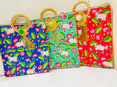100 Rs each on buying 🏷in bulk | Call 📞 at 8619550223 pichwai bag LAMANSH® Pichwai 🐄 Floral Print Gift 🎁 bags with gota chudi handle , Pom Pom & Tassels work | Bags for Return Gifting 🎁 in Indian wedding & Puja ceremony