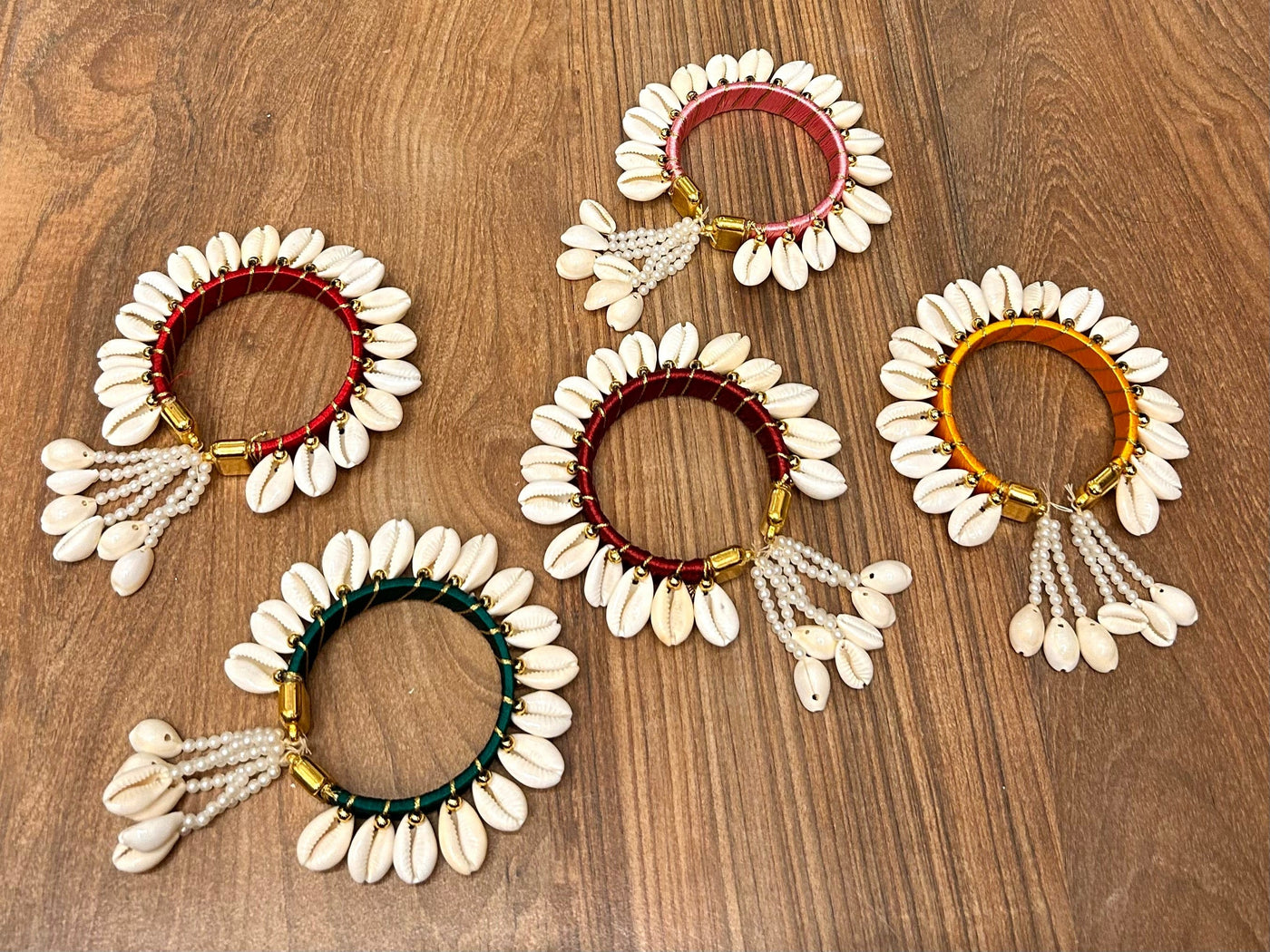 100 Rs pair on buying 25 pairs / WhatsApp at 8619550223 to order 🔥 Floral 🌺 Giveaways Shells Bangles with latkan for Haldi mehendi favours for bridesmaids 🎁