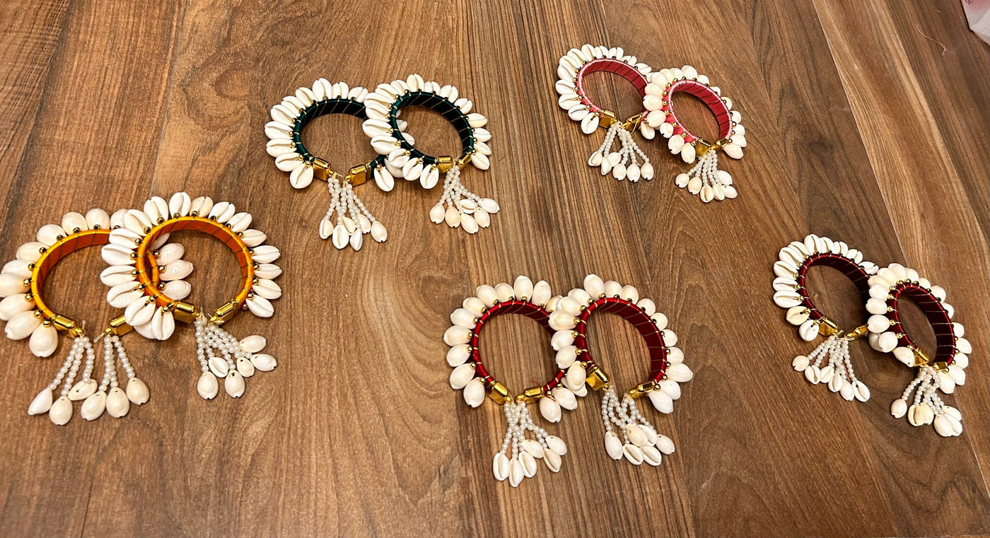 100 Rs pair on buying 25 pairs / WhatsApp at 8619550223 to order 🔥 Floral 🌺 Giveaways Shells Bangles with latkan for Haldi mehendi favours for bridesmaids 🎁