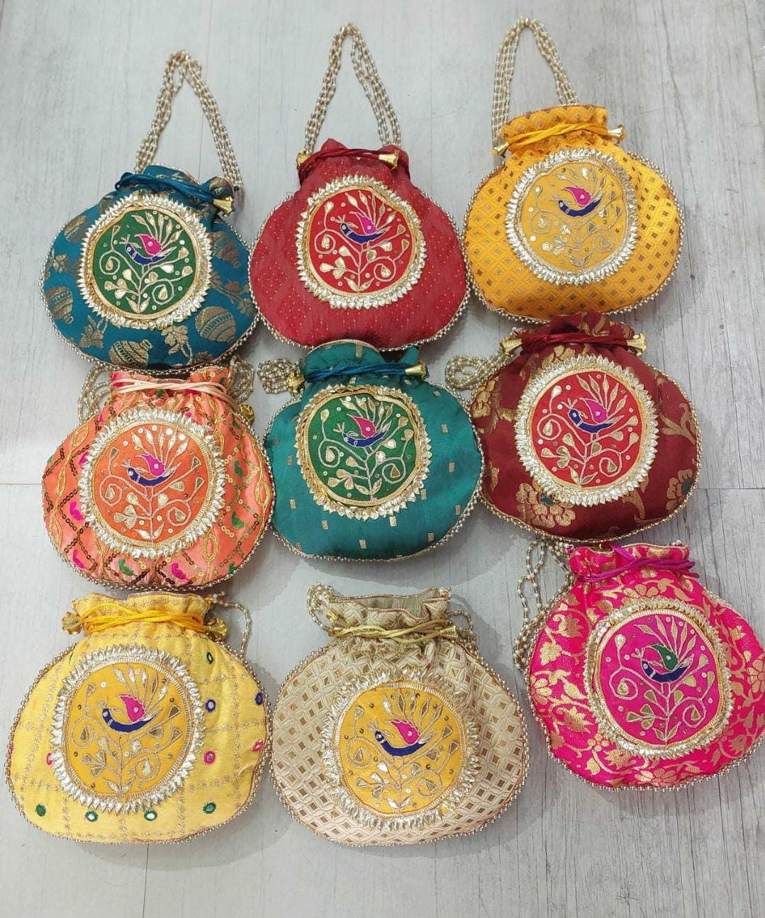 160 rs each on buying minimum 50 pcs 🏷 Women's Potli Bag LAMANSH® Designer Gota Patti Peacock work Potli bags for haldi mehendi ceremony favors & return gifts 🎁