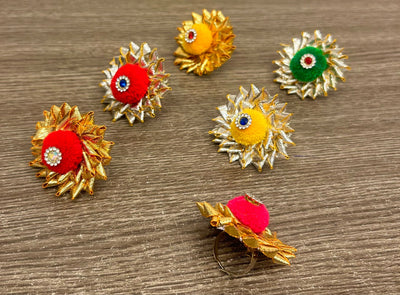 18 Rs each on buying 150+ pcs / WhatsApp at 8619550223 to order 🏷️ Floral 🌺 Giveaways Gota Pom pom rings for haldi mehendi sangeet favours 🎁 to bridesmaids