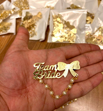 25 rs each on buying 100+ pcs | WhatsApp at 8619550223 Broaches TEAM BRIDE brooches for guests in weddings / Brooches for ladkiwale for barati's swagat
