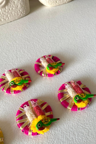 25 rs each on buying 100+ pcs | WhatsApp at 8619550223 haldi kumkum 1 Roli chawal in glass bottles with peacock design / platters on gota rings for festival, pooja or wedding favours 🎁