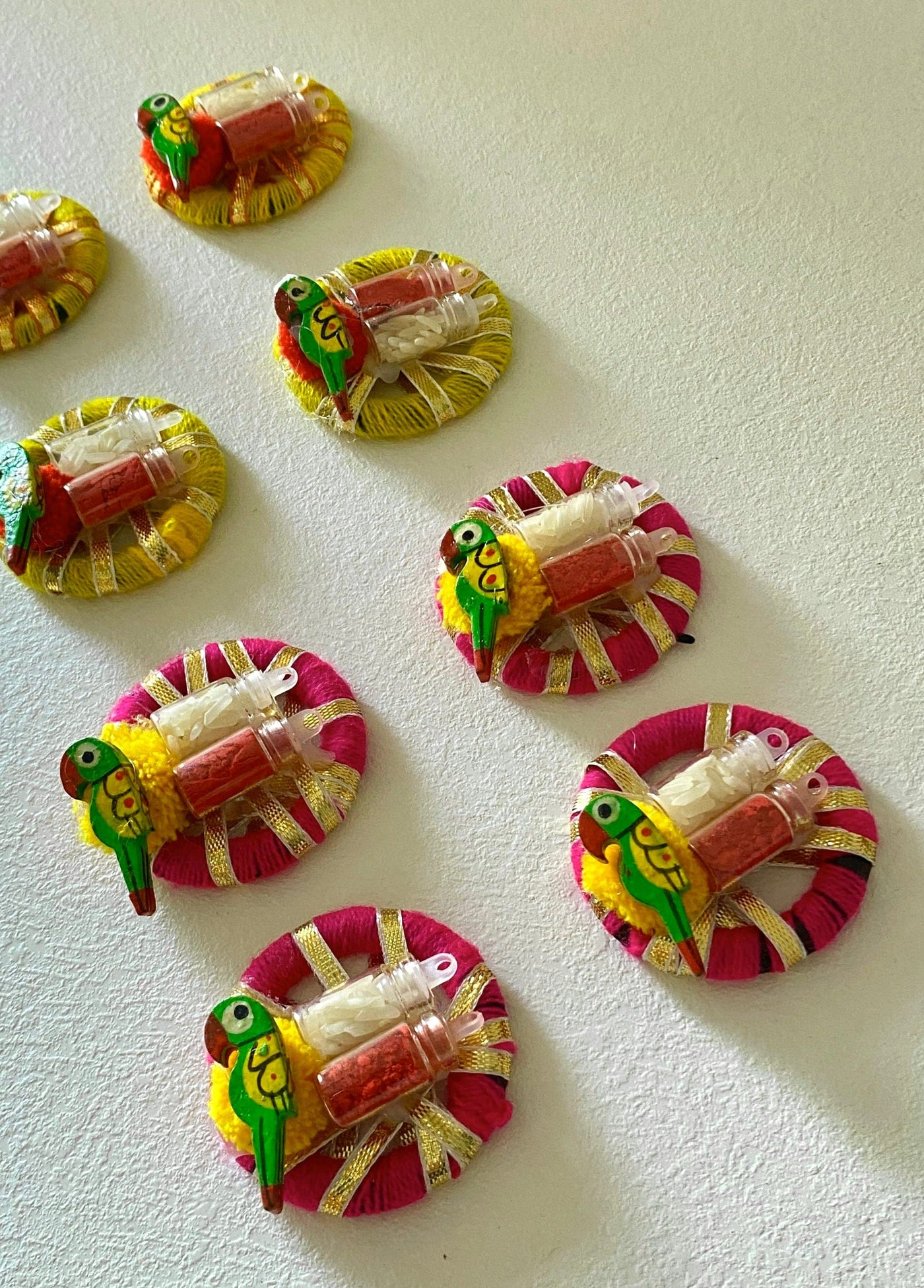 25 rs each on buying 100+ pcs | WhatsApp at 8619550223 haldi kumkum 1 Roli chawal in glass bottles with peacock design / platters on gota rings for festival, pooja or wedding favours 🎁