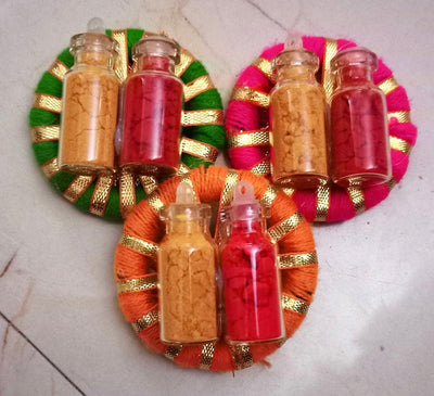 25 rs each on buying 100+ pcs | WhatsApp at 8619550223 haldi kumkum Haldi kumkum in glass bottles / Haldi kumkum platters on gota rings for festival, pooja or wedding favours 🎁