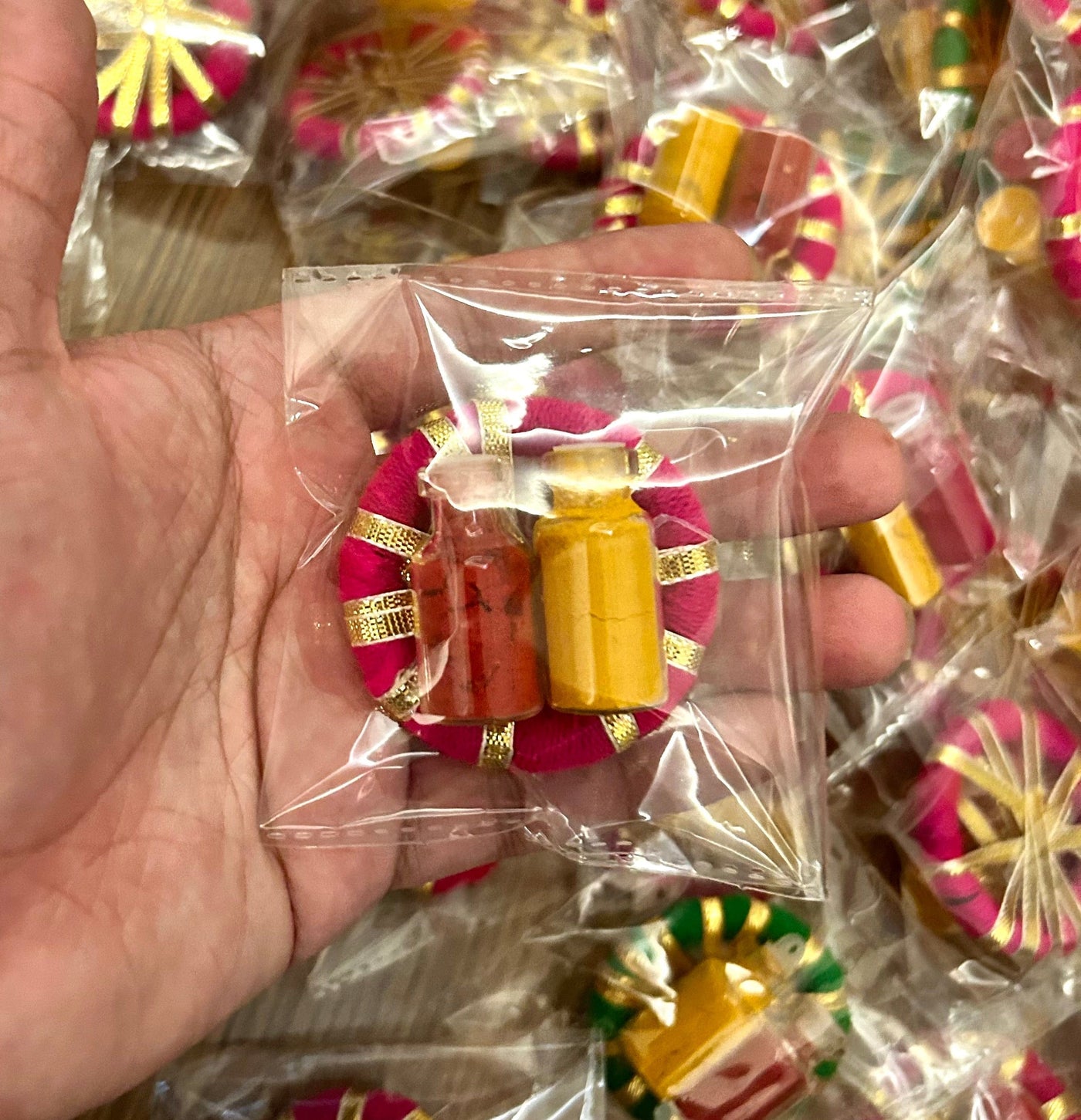 25 rs each on buying 100+ pcs | WhatsApp at 8619550223 haldi kumkum Haldi kumkum in glass bottles / Haldi kumkum platters on gota rings for festival, pooja or wedding favours 🎁