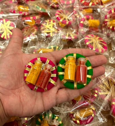 25 rs each on buying 100+ pcs | WhatsApp at 8619550223 haldi kumkum Haldi kumkum in glass bottles / Haldi kumkum platters on gota rings for festival, pooja or wedding favours 🎁