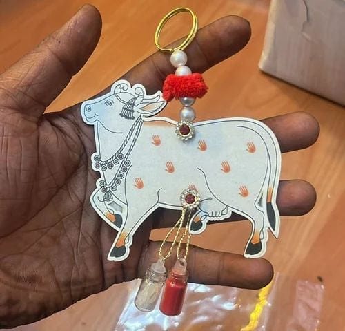 36 Rs each on buying 50+ pcs / WhatsApp at 8619550223 to order roli chaval basket Pichwai Kamdhenu cow hangings with Roli Chawal bottles / Favours 🎁 for Rakhi, Diwali, Navratri, Pooja ceremony & weddings for bridesmaids and guestsi