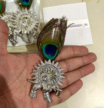 40 rs each on buying 50+ pcs / WhatsApp at 8619550223 to order Broaches LAMANSH Metal Designer bansuri brooches with mor pankh 🦚 / Welcome gifts for barati's and guests in weddings and hotels resorts or destination weddings