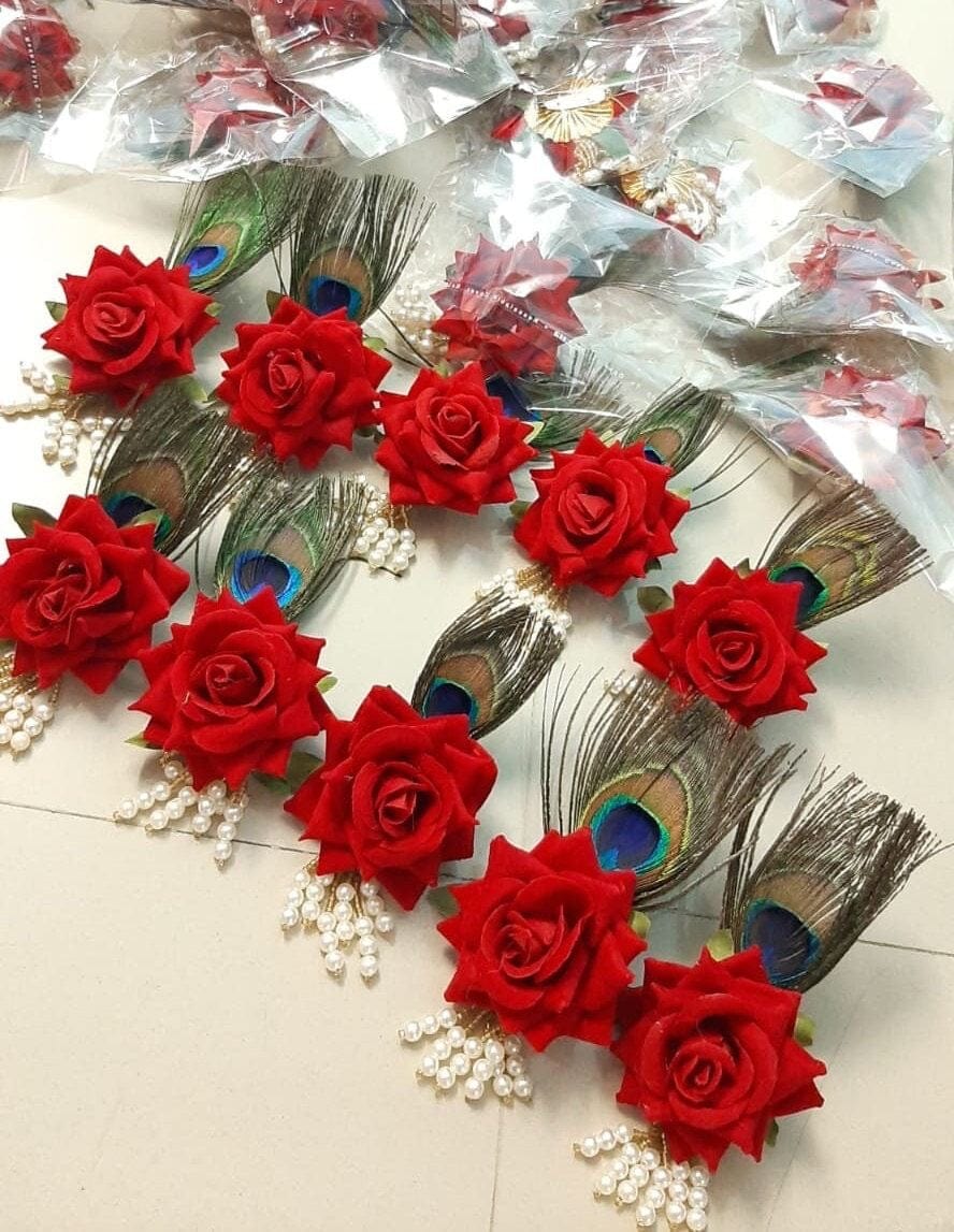 45 Rs each on buying 50 pcs / WhatsApp at 8619550223 to order 🏷️ Floral 🌺 Giveaways LAMANSH Floral red rose brooches with mor pankh for bridesmaids in haldi Mehendi ceremony / Brooches for barati's guests welcome in weddings and pooja