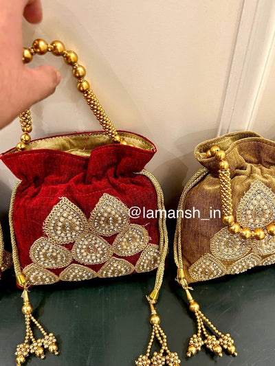 450 rs each on buying 10+ pcs / WhatsApp at 8619550223 to order 🔥 Women's Potli Bag 1 Heavy stone work designer velvet potli bags for wedding favours 🎁 and giveaways to bridesmaids in haldi Mehendi ceremony