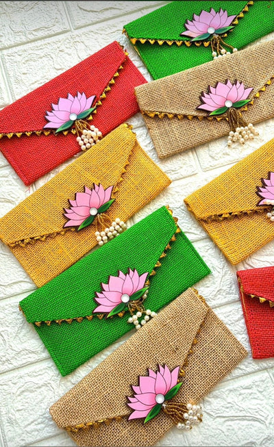 50 rs each on buying 50+ pcs / WhatsApp at 8619550223 to order 🔥 Clutch 1 Jute lotus envelopes clutches for wedding favours 🎁