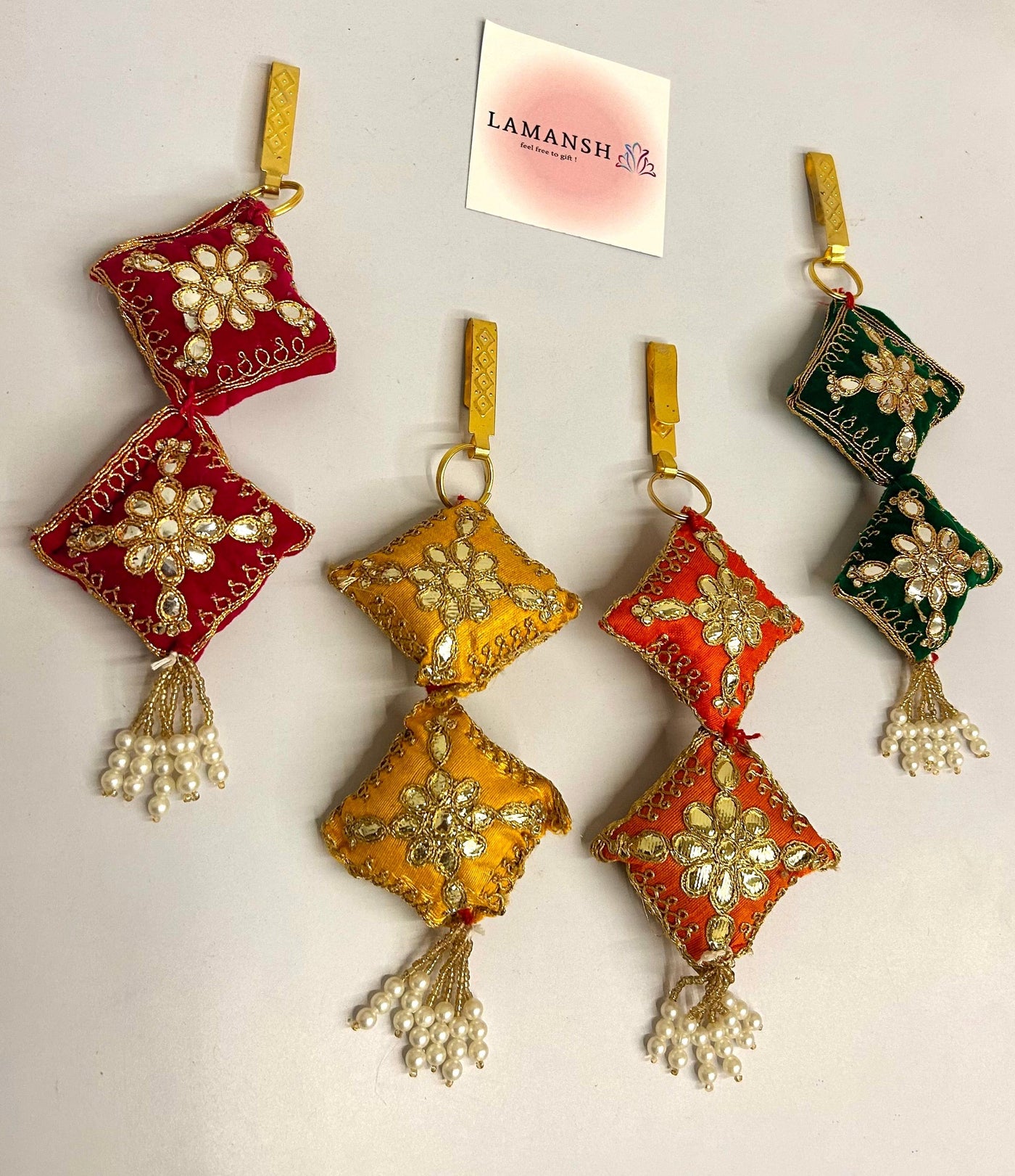 55 Rs each on buying 50+ pcs / WhatsApp at 8619550223 to order satka pins Designer fabric embroidered satka's keychains for ladies | haldi mehendi sangeet favors for bridesmaids in weddings