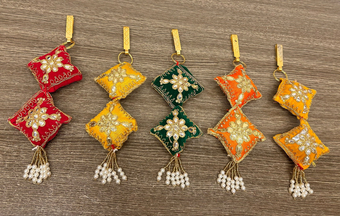 55 Rs each on buying 50+ pcs / WhatsApp at 8619550223 to order satka pins Designer fabric embroidered satka's keychains for ladies | haldi mehendi sangeet favors for bridesmaids in weddings