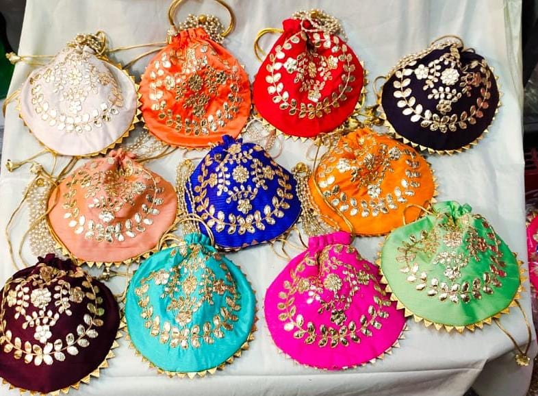 65 rs each on buying 50 pcs / WhatsApp at 8619550223 to order Women's Potli Bag LAMANSH gota embroidered potli bags for giveaways in weddings / favours 🎁 for bridesmaids in haldi Mehendi ceremony