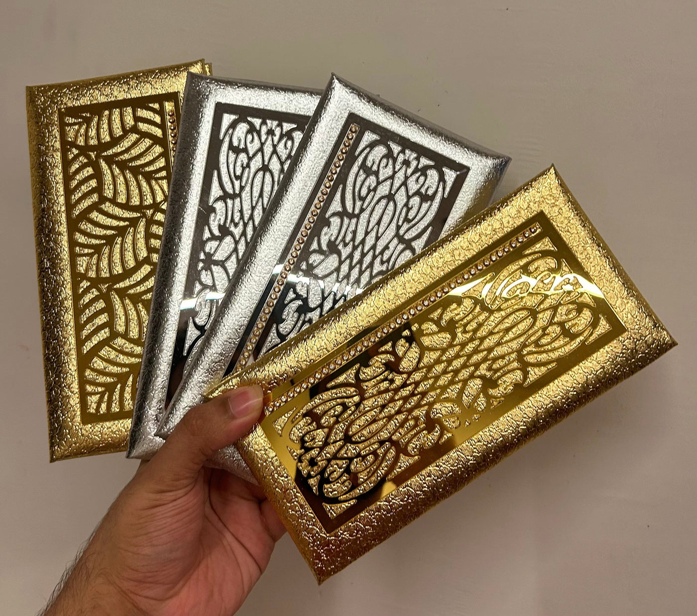 70 Rs each on buying 50+ pcs / WhatsApp at 8619550223 to order Clutch Fanvy Shagun envelopes for guests in weddings, pooja ceremony (Golden and silver color)