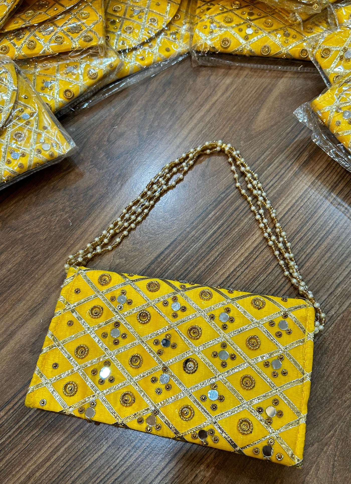 90 Rs each bracelet on buying 50+ pcs / WhatsApp at 8619550223 to order 🏷️ Clutch LAMANSH yellow 💛 color designer mirror work clutches envelopes for bridesmaids and wedding favours