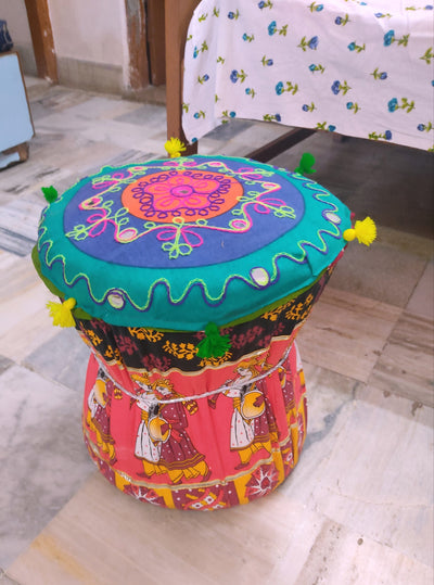 Lamansh Rajasthani Themed Backdrop ( Rajasthani Mudda's , Paper Fans & Woolen Tassels )