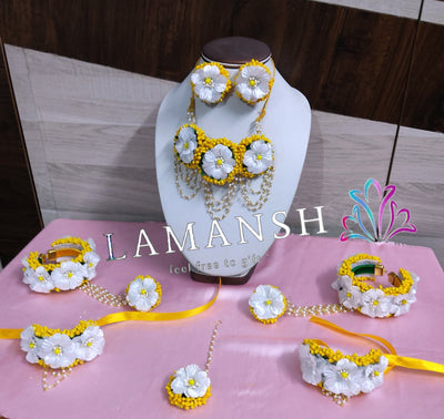 Yellow white flower jewellery set with bajuband for weddings